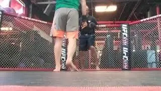 Ty. Walk down, takedown to cage, GnP.