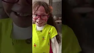 Eloah wearing daddy's shoe