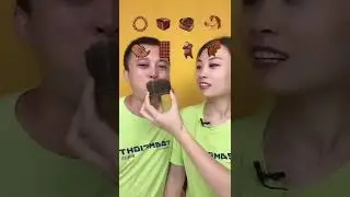 Couple Eating Chocolate Ice Cream Pops | 
