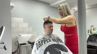 Beautiful Barberette Giving Haircut