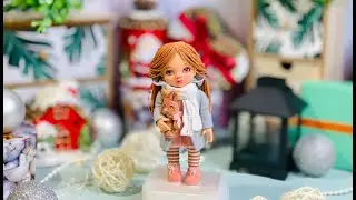 обзор фигурки Кукла Малышка в пальто с игрушкой зайка