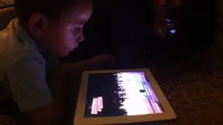 Marcos playing with our iPad
