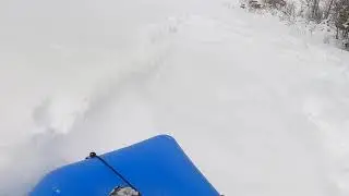 Snow Rafting - early run sitting feet first