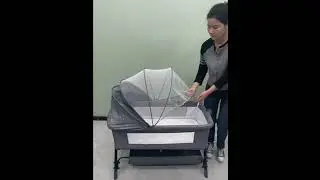 Детская кроватка на колесиках