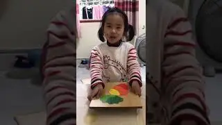 Minh Hà ghép hình cà rốt