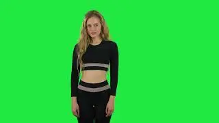 Blonde Girl Coquettishly Smiling While Looking at Camera  Green Screen Video Effect