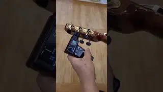 cara menyetem gitar dengan alat 
