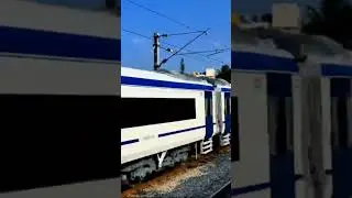 Vande bharat train cross the station, Indian Railways.