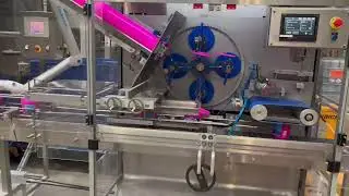 Rotary pick and place lidding machine.