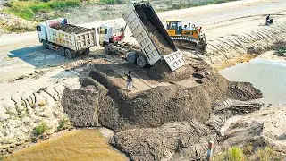 best New Project and efficient worker Dozer With 12 Wheel Truck Push Sand Filling Sand the Big Lake