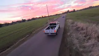 Xmas light truck chase at sunset