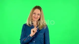 Portrait of Fair Woman Is Saying Oops and Shrugging, Flirting. Green Screen | Stock Footage - En...