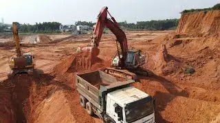 Excavator Loading MAN Trucks with Two Passes, KOMATSU & HITACHI Working on Construction Site - JCB