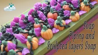 Cold process soap with sculpted layers and soap piping, a subtle Halloween themed soap.