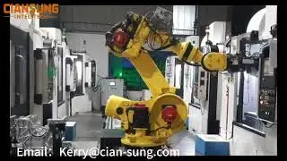 Industrial robot with linear axes for loading and unloading multiple machining centers.