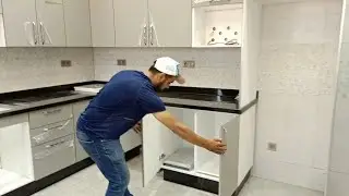 مطبخ عصري من ام دي اف جلوس لون رمادي اروع تصميم جديد 2022 /جولةفي كوزينهmdf روعة باللون كري