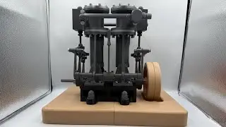 Double cylinder steam engine with reverse gear