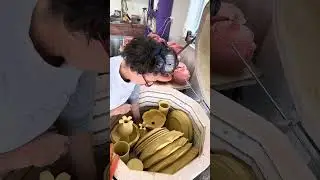 Loading the top layer of my bisque fire