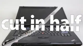 Thinkpad laptop cut in half with waterjet