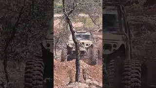 Extreme Suzuki Samurai on 38'5 inch trepador climbing steep hill 