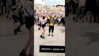 Newly engaged couple swallowed by a "wall of death" #metal #proposal #copenhell
