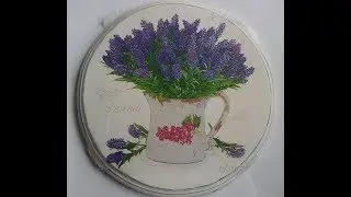 Gluing doilies to the surface in decoupage.