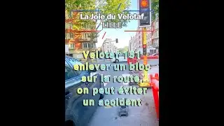 Velotaf 151 enlever un bloc sur la route, on peut éviter un accident