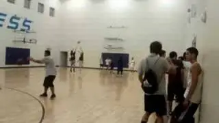 antom playing basketball at the gym