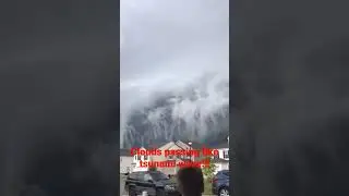 Clouds passing like tsunami wave!!!