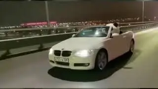 Панда в кабриолете на Ворошиловском мосту