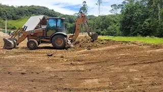 Terra planagem no sítio