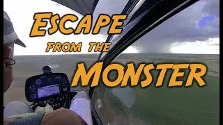 Escape from the Monster - Kallithea gyroplane flies around a scary looking rain cell in Wyoming...