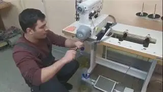 Changing the oil on a Jack 8569 ADI industrial flat-bed sewing machine