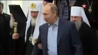 Путин уступил место в машине Патриарху Кириллу