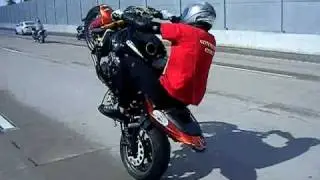 Ride of the Century 2009- 60 MPH stand up wheelies on the highway!