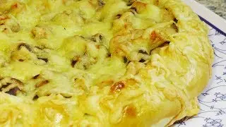 Pie with chicken fillet and mushrooms