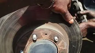 how to replace front brake disc on a 2018 Hilux