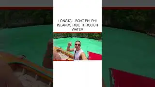 LONGTAIL BOAT PHI PHI ISLANDS RIDE THROUGH WATER