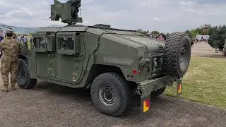 US HUMWEE WITH MOUNTED MASCHINE GUN, MILITARY VEHICLES AND MERCEDES TRUCK