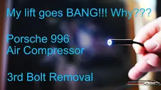 How to remove the third bolt from the air compressor on a 996. My lift also goes bang!!!!
