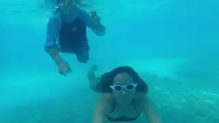 Underwater fun with Daddy and Mommy at Plantation bay resort