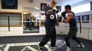 Zhanat Zhakiyanov on the body belt with Ricky Hatton