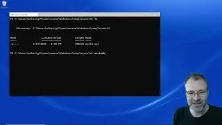 Load and get going with the "world" database using the terminal client