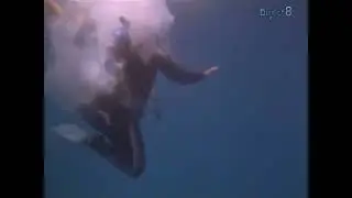 Sexy blonde Scuba Girl unconscious underwater after explosion
