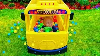 Wheels on the bus Little girl pretend play  driver of School bus Watch Nursery Rhymes & Kids Songs