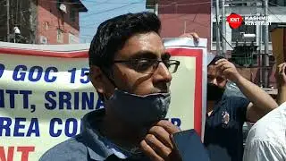 Shopkeepers protest along with their children after their shops handed over to ex-service men