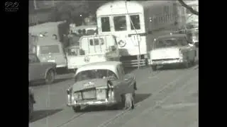 [Public Domain] 1956 (Showa 31). Japan. A road crowded with cars.