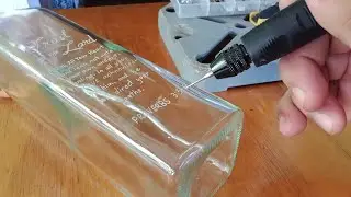 You can get an idea here on how to engrave on glass!