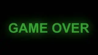 Game over retro green computer screen text typing animation on black background.