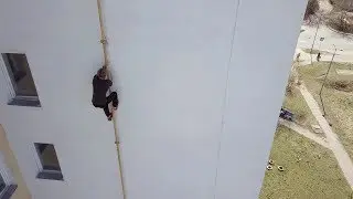 Climbing 11-storey building